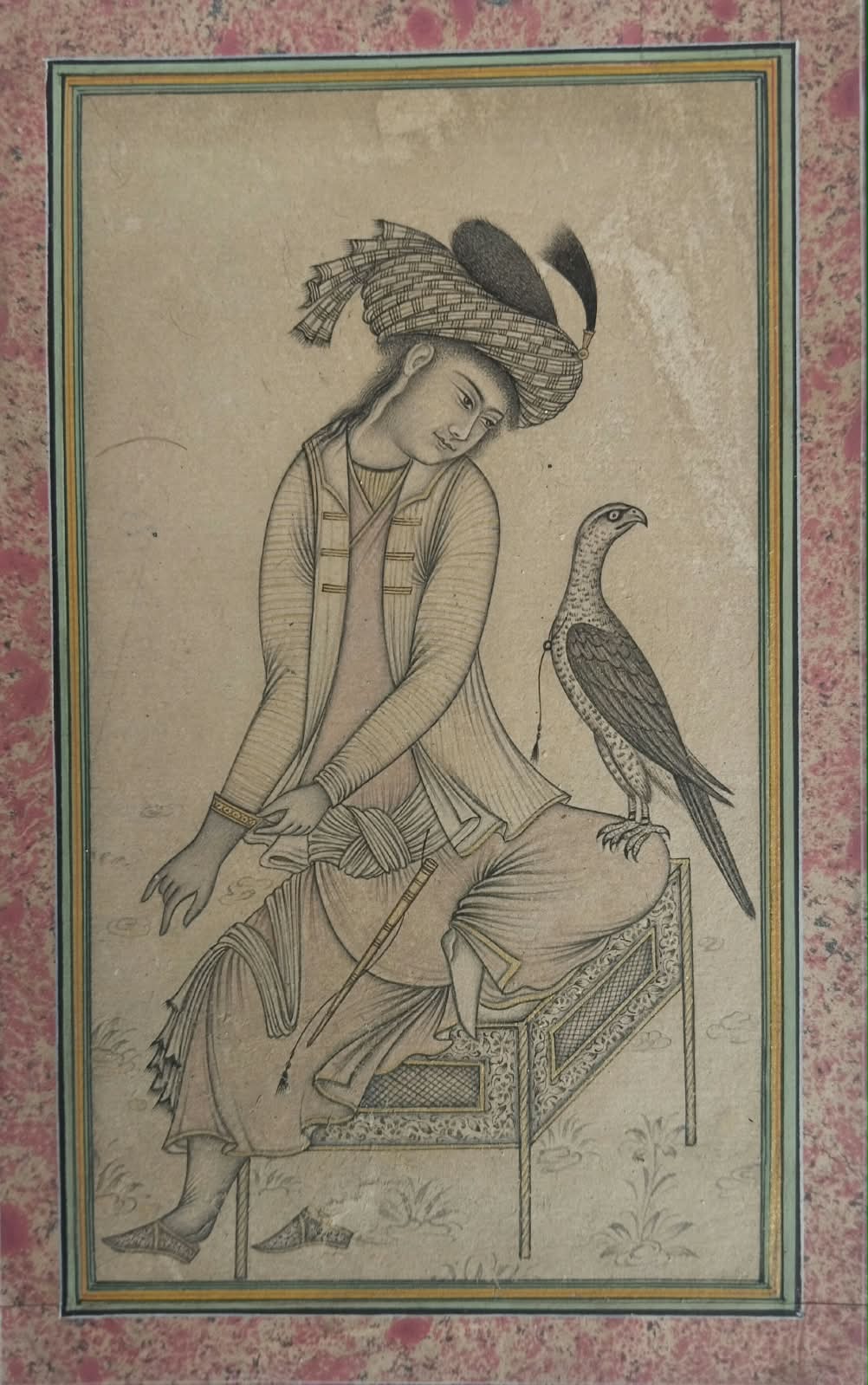 Mughal miniature painting depiction of seated prince with a falcon